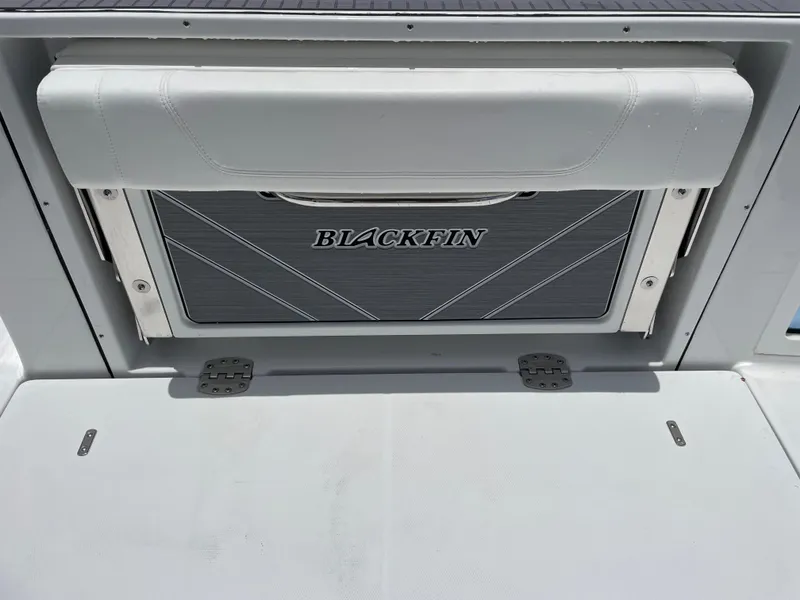 Slide: The Image of 2024 Blackfin 332cc boat interior detail with logo. - 13