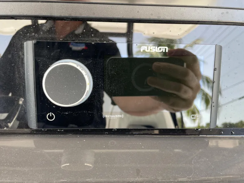 Slide: The Image of Fusion audio system on a 2024 Blackfin 332cc boat. - 21