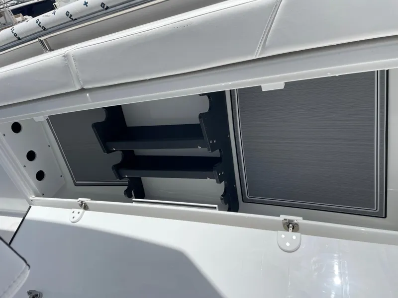 Slide: The Image of 2024 Blackfin 332cc boat storage compartment with open hatch. - 30