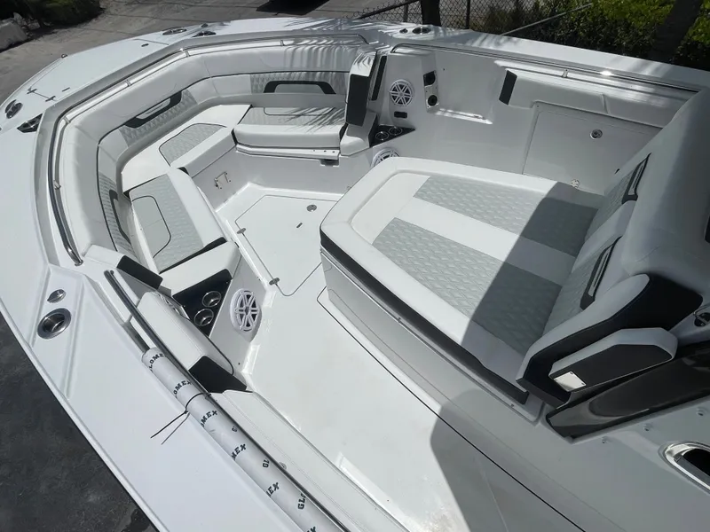Slide: The Image of 2024 Blackfin 332cc boat interior with white and gray seating. - 31
