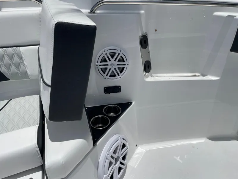 Slide: The Image of 2024 Blackfin 332cc boat interior with speakers and cup holders. - 38