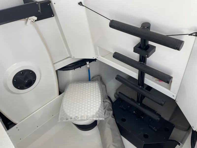 Slide: The Image of 2024 Blackfin 332cc boat interior with ladder and storage area. - 46