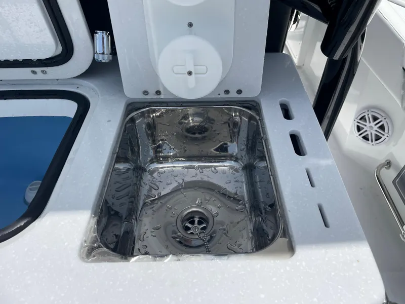 Slide: The Image of 2024 Blackfin 332cc boat sink and countertop detail. - 7