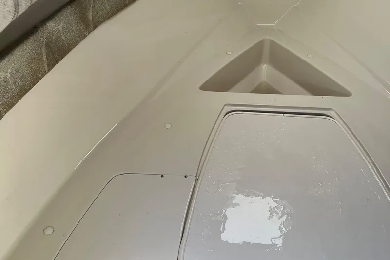 Slide: The Image of 2005 Aquasport 215 Explorer boat interior, clean and well-maintained. - 6