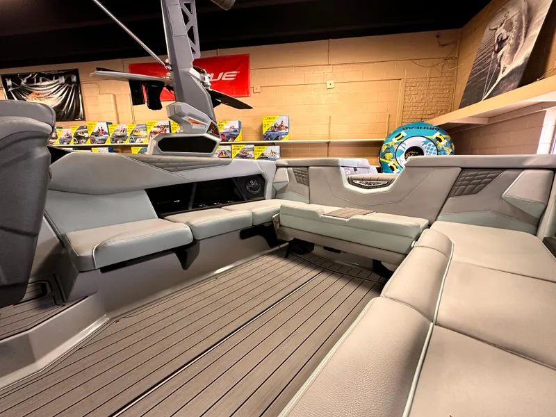 Slide: The Image of 2023 Nautique S23 boat interior with spacious seating and modern design. - 5