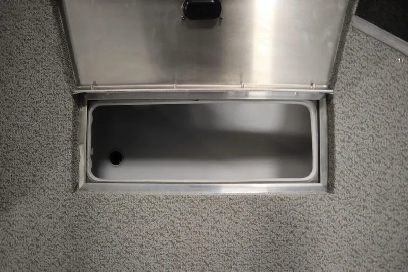 Slide: The Image of Open storage compartment in 2024 Lowe Fishing Machine 1675WT boat. - 19
