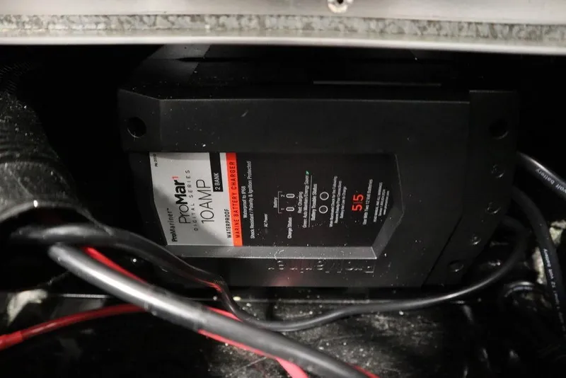 Slide: The Image of Battery charger in 2024 Lowe Fishing Machine 1675WT boat, featuring ProMariner ProSport 10 Amp. - 23