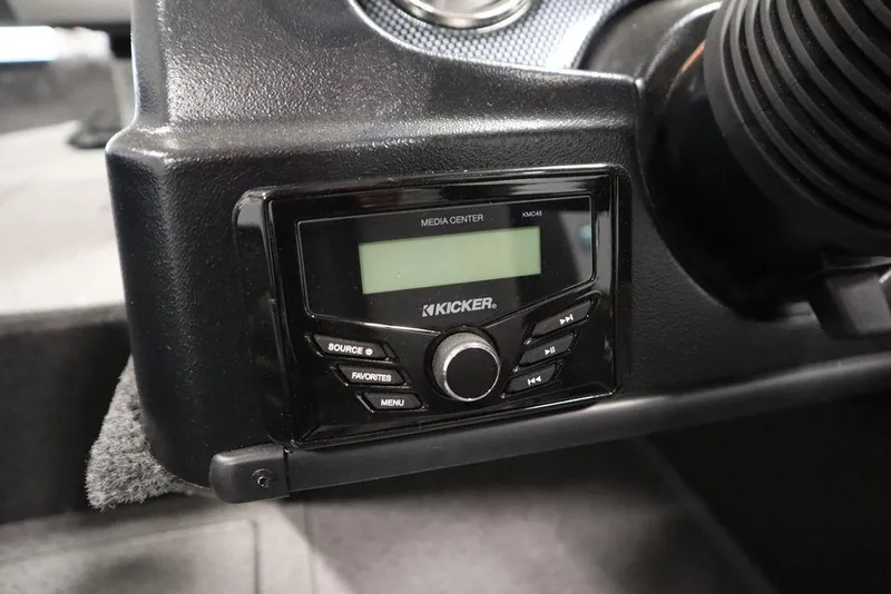 Slide: The Image of Kicker media center in 2024 Lowe Fishing Machine 1675WT boat dashboard. - 32