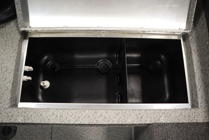 Slide: The Image of 2024 Lowe Fishing Machine 1675WT livewell compartment, open and empty. - 44