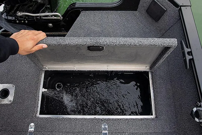 Slide: The Image of 2024 Lowe Fishing Machine 1675WT livewell with water filling, open lid view. - 54