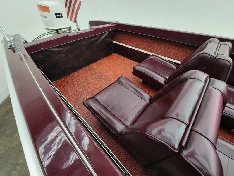 Slide: The Image of 1969 Crestliner Marauder boat interior with red leather seats and vintage design. - 38