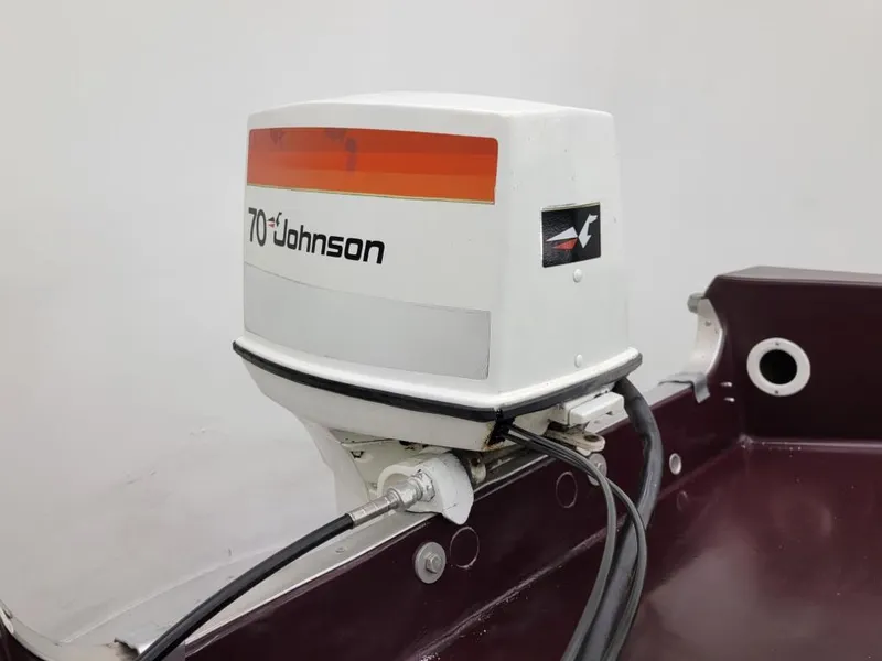 Slide: The Image of 1969 Crestliner Marauder with Johnson 70 HP outboard motor. - 47