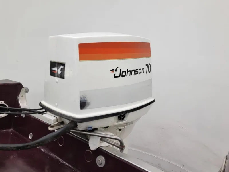 Slide: The Image of 1969 Crestliner Marauder with Johnson 70 outboard motor. - 49