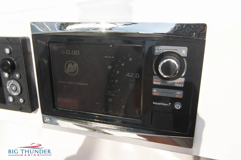 Slide: The Image of Close-up of 2019 Spectre Screaming Eagle 22 Talon boat control panel. - 27