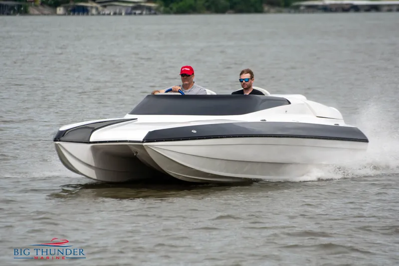 Slide: The Image of 2019 Spectre Screaming Eagle 22 Talon speedboat on the water. - 3