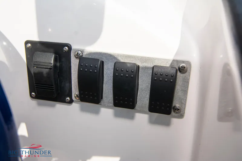 Slide: The Image of Control panel of a 2019 Spectre Screaming Eagle 22 Talon boat. - 30