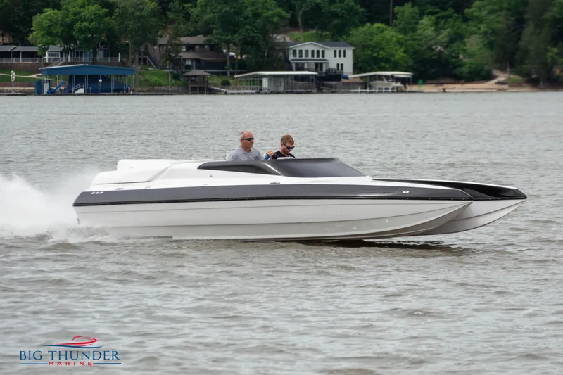The Image of 2019 Spectre Screaming Eagle 22 Talon speedboat cruising on a lake. - 0