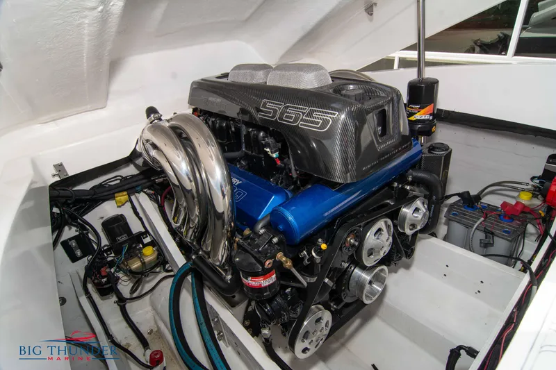 Slide: The Image of 2019 Spectre Screaming Eagle 22 Talon boat engine in a clean white compartment. - 38