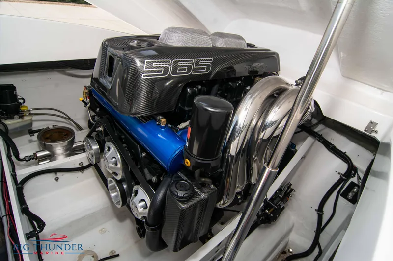 Slide: The Image of 2019 Spectre Screaming Eagle 22 Talon engine compartment with S65 engine. - 39