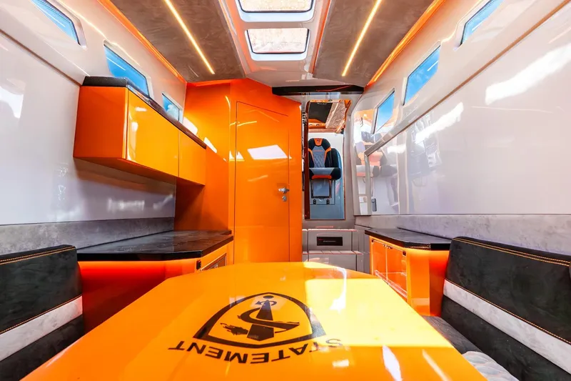Slide: The Image of Futuristic interior of 2026 Statement 47 GTrs with vibrant orange accents and sleek design. - 11