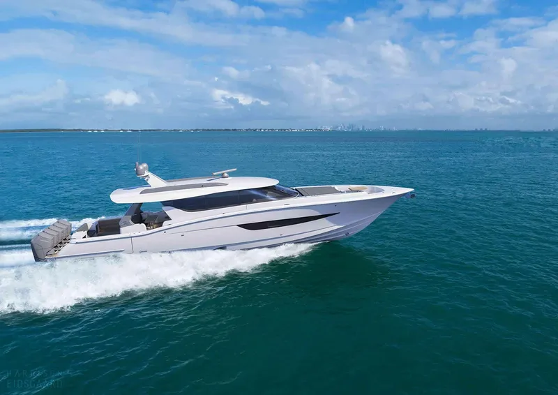 Slide: The Image of Luxury 2025 Scout 67 LX yacht cruising on open water under blue sky. - 1