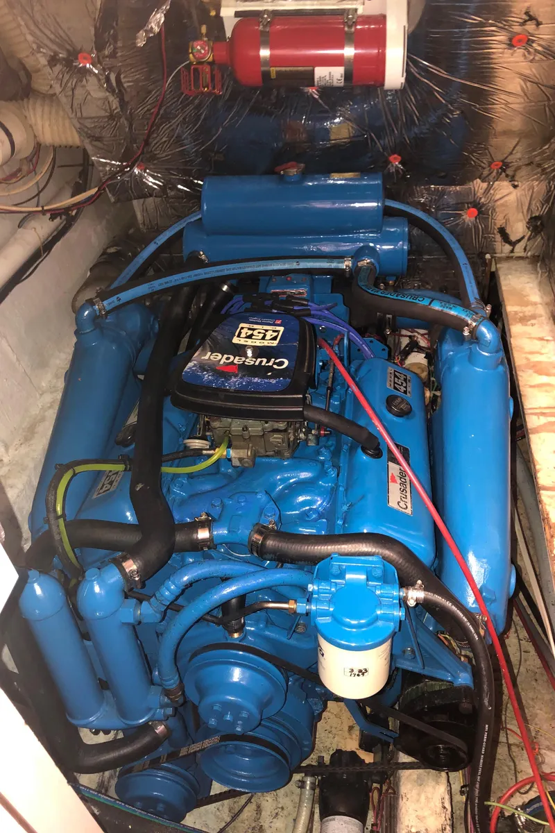 Slide: The Image of 1990 Bluewater Sedan engine compartment with Crusader engine. - 40