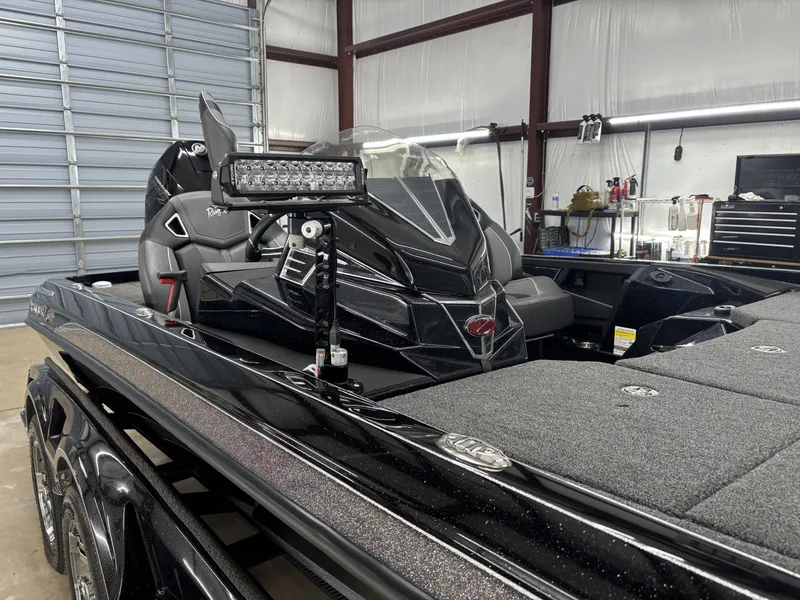 Slide: The Image of 2023 Ranger Z521R Cup Equipped boat in a workshop. - 5