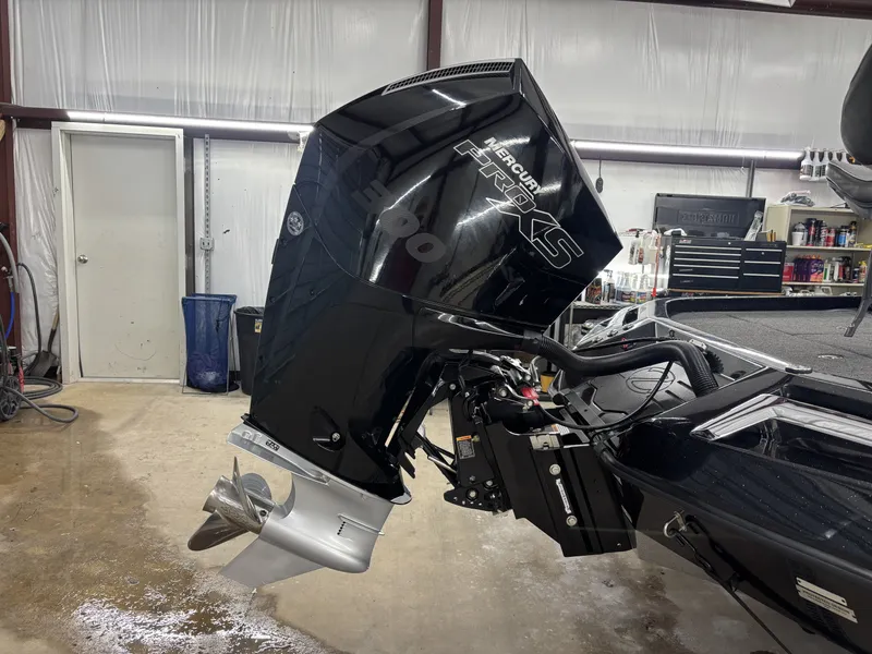 Slide: The Image of 2023 Ranger Z521R boat with Mercury Pro XS engine in workshop. - 6