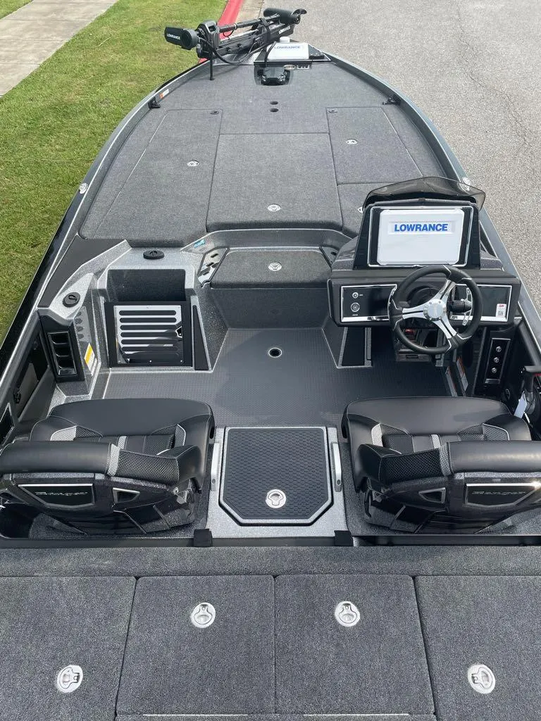 Slide: The Image of 2024 Ranger Z521R Ranger Cup Equipped boat interior with Lowrance electronics. - 2