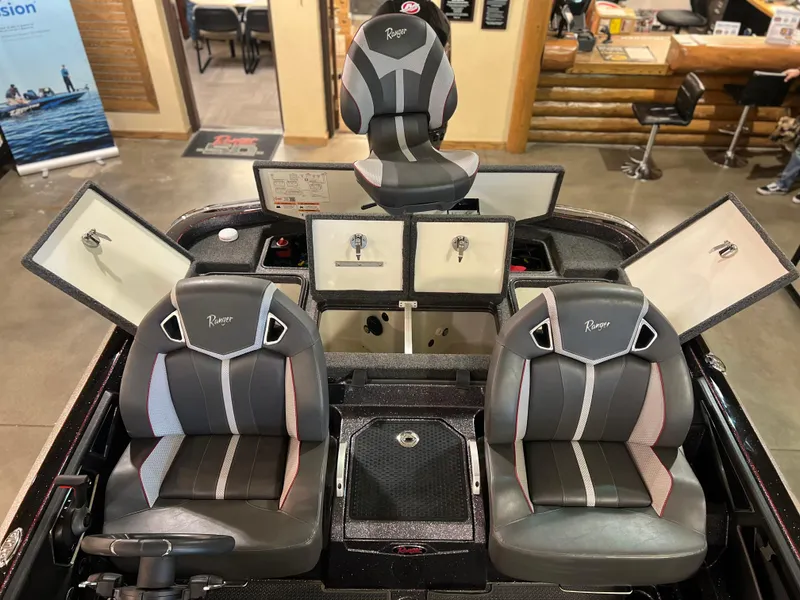 Slide: The Image of 2024 Ranger Z521R Ranger Cup Equipped boat interior with dual seats and storage compartments. - 7