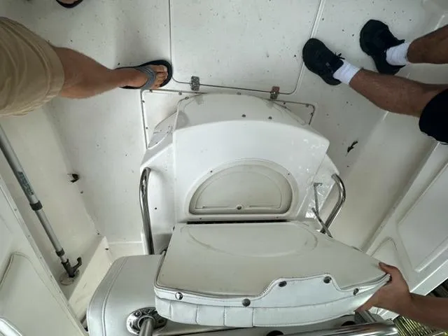 Slide: The Image of Interior of a 2002 Fountain 25 C/C boat with seating area. - 19