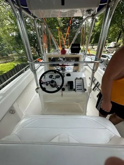 Slide: The Image of Interior view of a 2002 Fountain 25 C/C boat with steering console. - 6