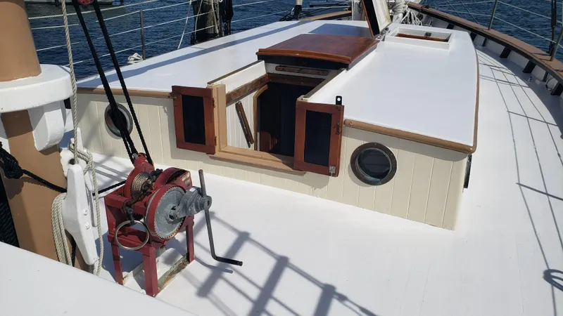 Slide: The Image of 1996 Custom Biloxi Schooner deck with open hatch and winch. - 36