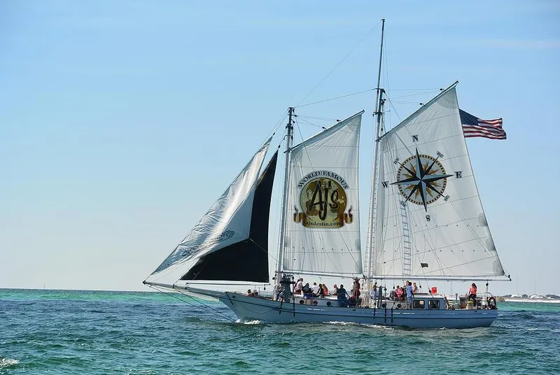 Slide: The Image of 1996 Custom Biloxi Schooner sailing with passengers on a sunny day. - 4