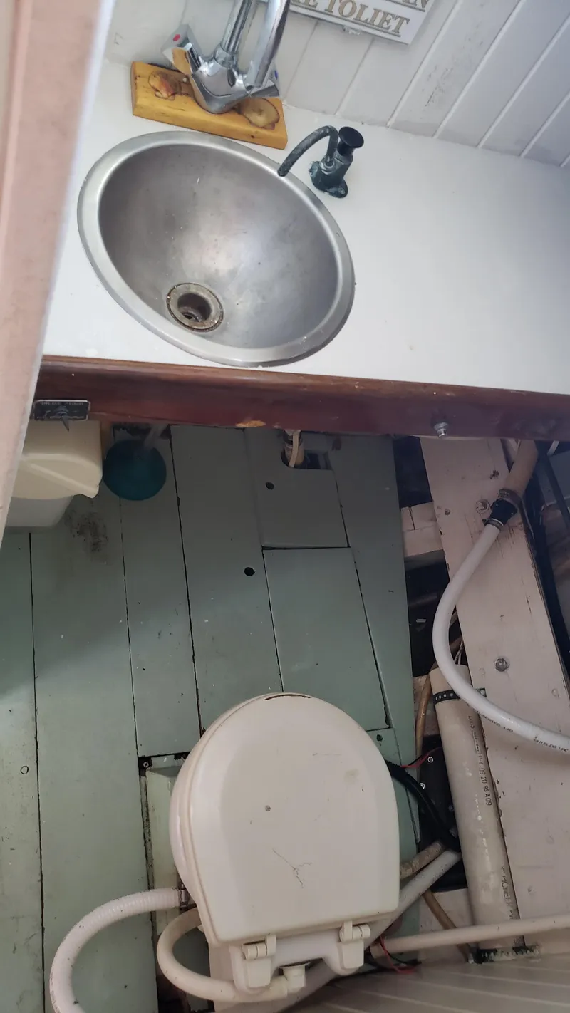 Slide: The Image of 1996 Custom Biloxi Schooner bathroom with sink and toilet - 44
