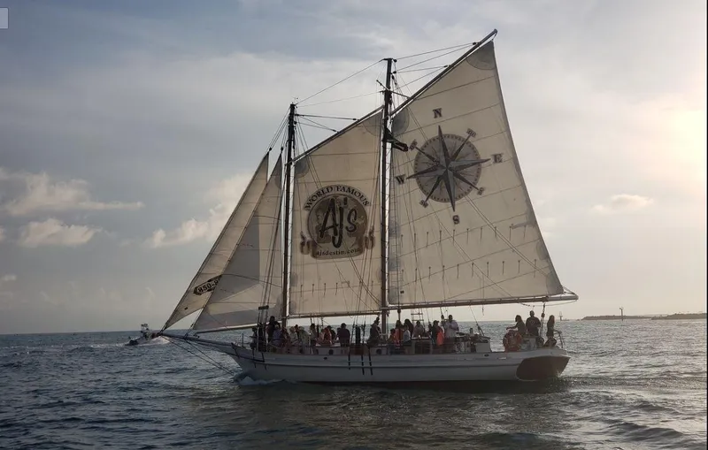 Slide: The Image of 1996 Custom Biloxi Schooner sailing with passengers at sunset - 6