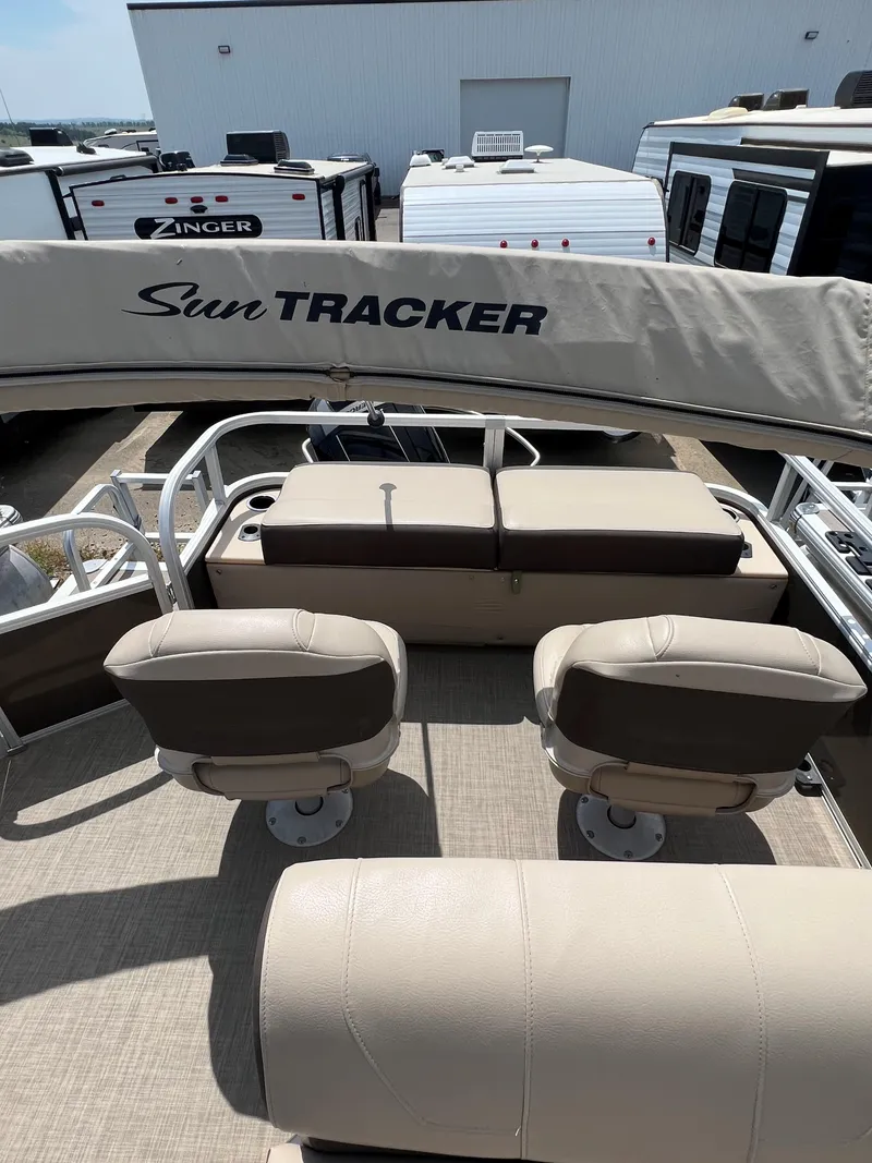 Slide: The Image of 2018 Sun Tracker SportFish 22 XP3 pontoon boat interior with seating. - 14