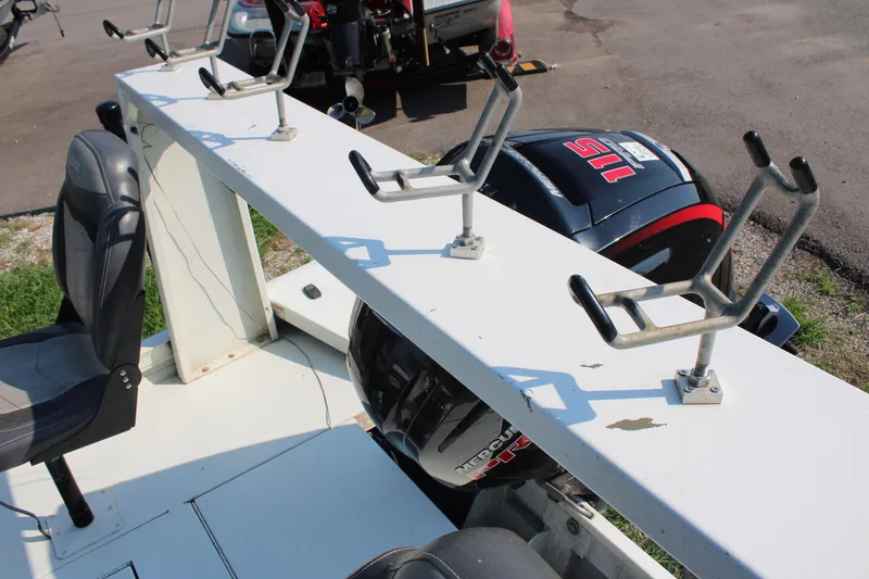 Slide: The Image of Lowe CAT 20 boat, 2020 model, featuring multiple fishing rod holders and seating. - 12