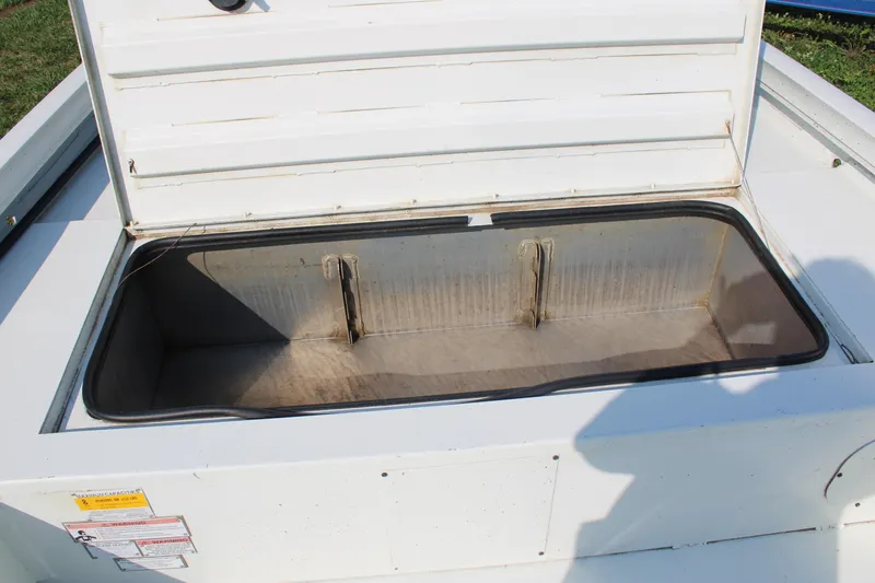Slide: The Image of Open storage compartment of 2020 Lowe CAT 20 boat. - 9