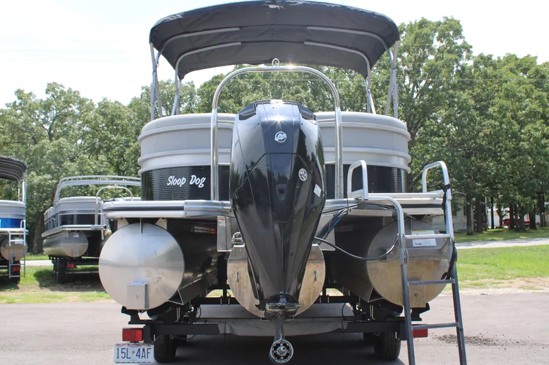 Slide: The Image of 2021 Lowe SS250 Super Sport pontoon boat with outboard motor, rear view. - 11