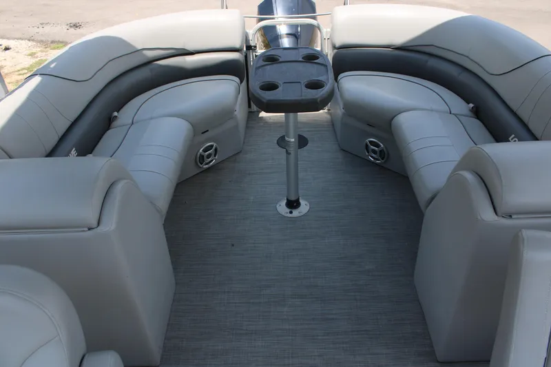 Slide: The Image of 2021 Lowe SS250 Super Sport boat interior with plush seating and cup holders. - 3