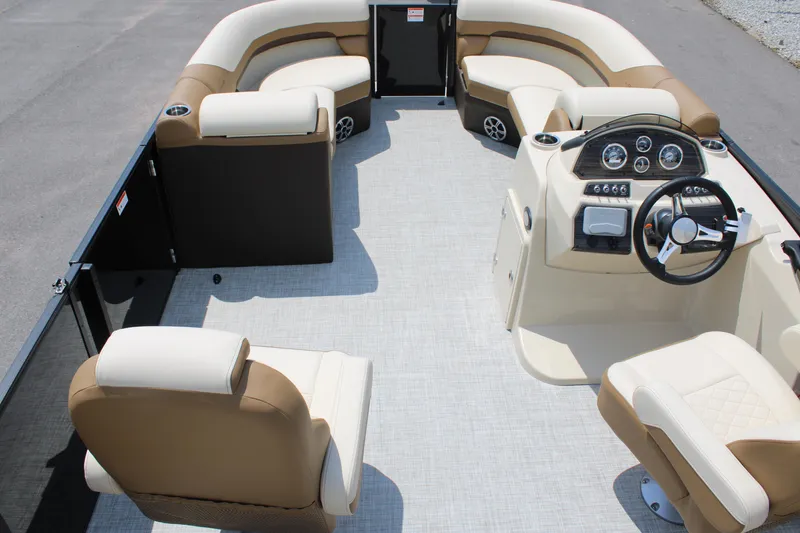 Slide: The Image of 2023 Lowe SS210 Super Sport pontoon boat interior with beige and brown seating. - 6