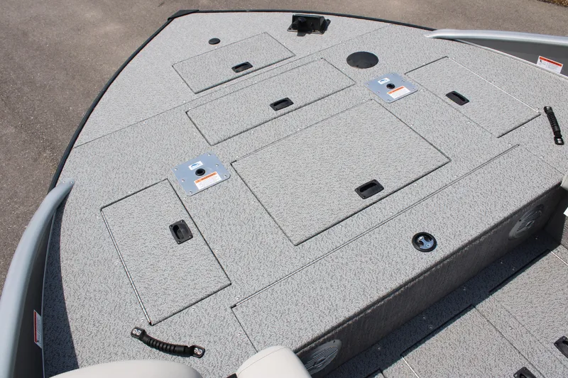 Slide: The Image of 2023 Lowe SD224 Sport Deck boat deck with storage compartments. - 7