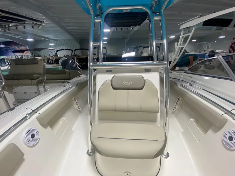 Slide: The Image of 2024 Key West 239 FS boat interior with seating and stainless steel frame. - 18