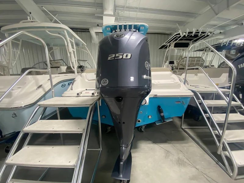 Slide: The Image of 2024 Key West 239 FS boat with Yamaha 250 outboard motor in showroom. - 3