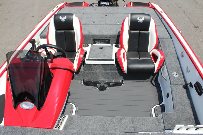 Slide: The Image of 2024 Phoenix 21 PHX boat interior with dual black and red seats. - 12