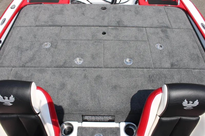 Slide: The Image of 2024 Phoenix 21 PHX boat deck with gray carpet and black-red seats. - 16