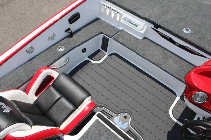 Slide: The Image of 2024 Phoenix 21 PHX boat interior with black and red seating. - 17