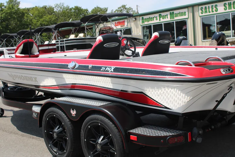 Slide: The Image of 2024 Phoenix 21 PHX boat at Angler's Port Marine sales shop. - 4