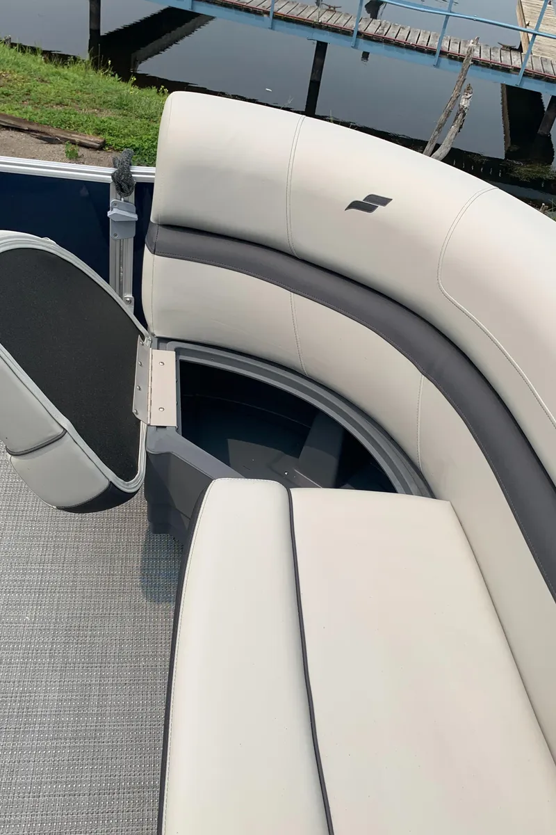 Slide: The Image of 2023 Starcraft EX 24 R boat interior seating area. - 8